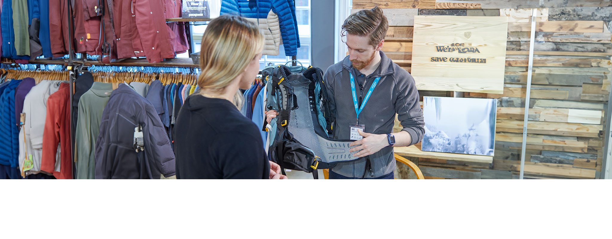 Book an appointment - a woman getting advice from in-store expert